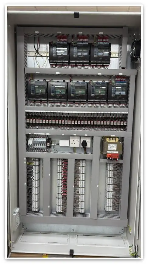 Control panel manufacturing in UAE with PLC modules and industrial wiring